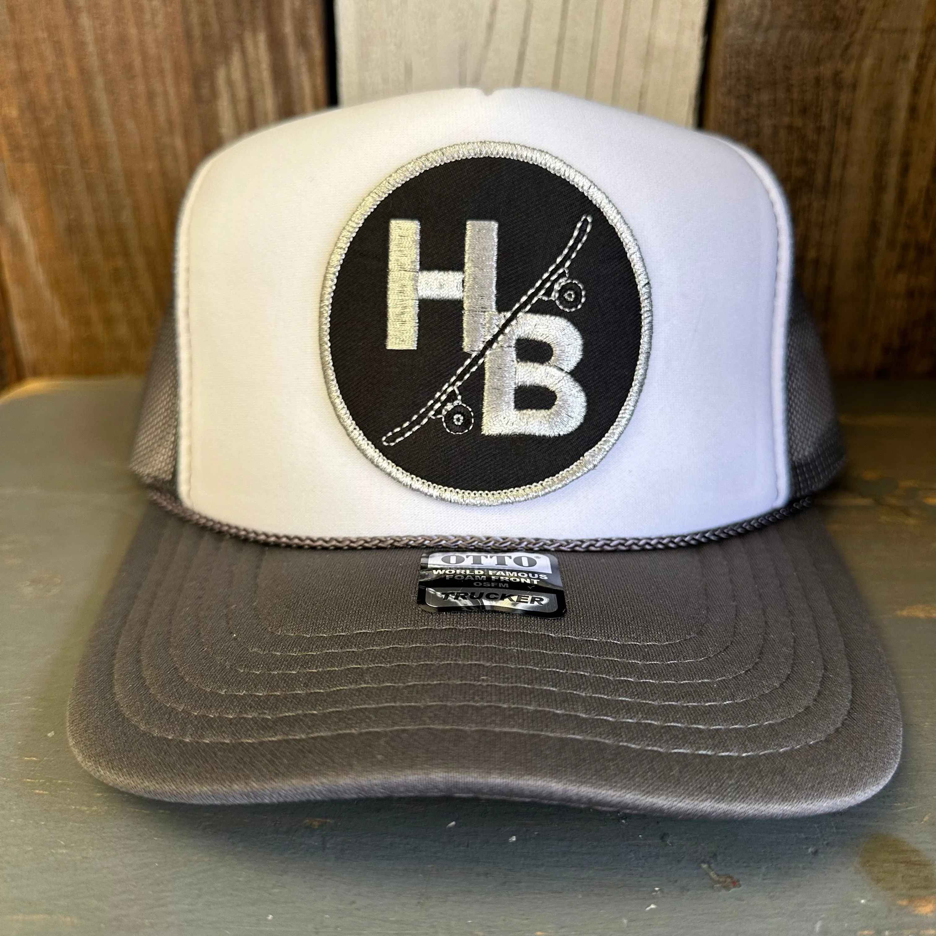 Hermosa Beach SKATEBOARDING WAS NEVER A CRIME Trucker Hat - Charcoal Grey/White/Charcoal Grey